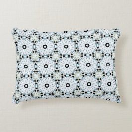 almohada decorativa con un patrón geométrico