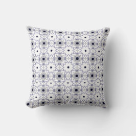 almohada decorativa con un patrón geométrico