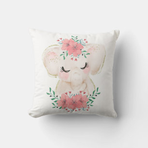 Almohada decorativa de elefante con flores en acua