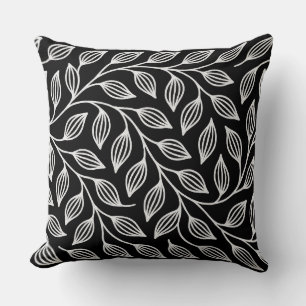 Almohada decorativa de hojas en blanco y negro