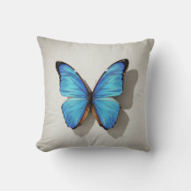 Almohada decorativa de mariposa azul inspirada en