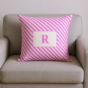 Almohada decorativa de rayas rosa y blanco con mon