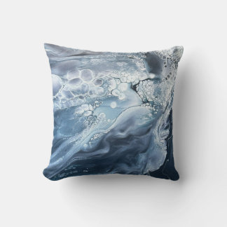 Almohada decorativa en azules y grises