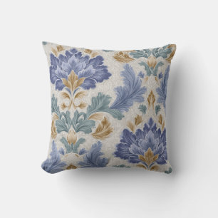 Almohada decorativa floral azul y dorada elegante