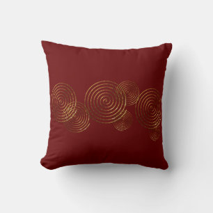 Almohada decorativa metálica dorada símbolo celta