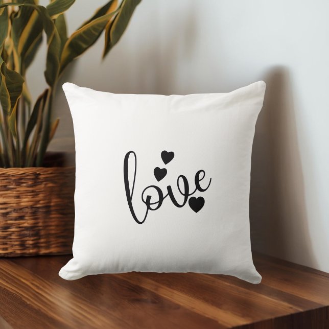 Almohada decorativa negra y blanca (Subido por el creador)
