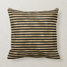 Almohada decorativa negra y rayada en dorado