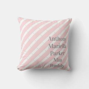 Almohada decorativa rosa y gris con raya blanca