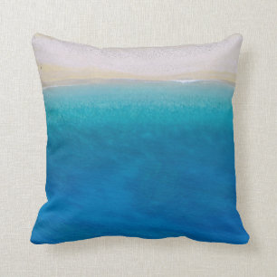 Almohada decorativa tema playa azul arenosa