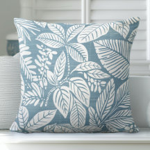 Almohada decorativa tropical azul silenciada