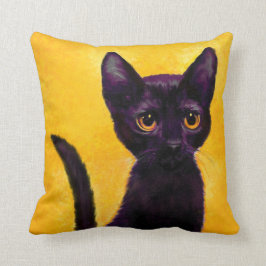 almohada del gato negro
