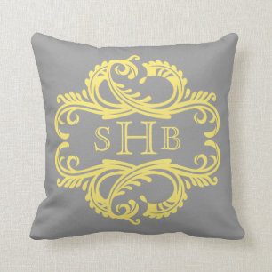 Almohada elegante amarilla del monograma del
