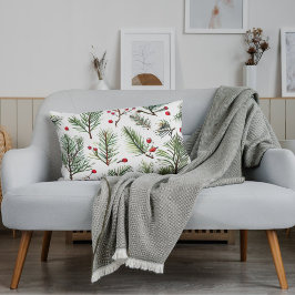 Almohada festiva de pino y bayas rojas