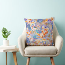 Almohada floral abstracta de vibrante naranja y az