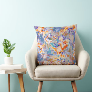 Almohada floral abstracta de vibrante naranja y az