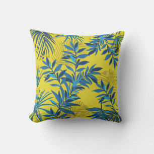 Almohada floral amarilla con vibrante azul y verde