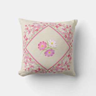 almohada floral de cosmos rosa y blanco