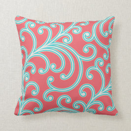 Almohada floral elegante en rojo y turquesa