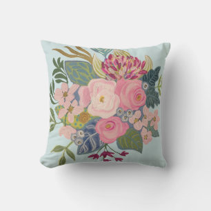 Almohada floral luminosa azul_brillante en el plan