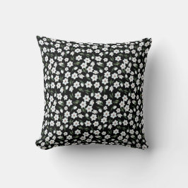 almohada floral negra con flores blancas