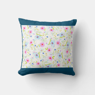 almohada florida en azul.