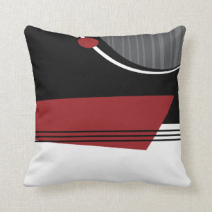 Almohada geométrica blanca y negra roja