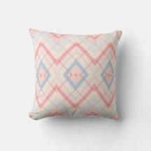 Almohada geométrica de cuadros pastel