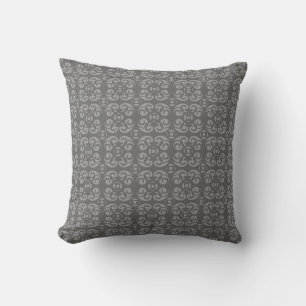 almohada gris con tonificación y rojo profundo