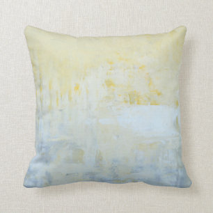 Almohada gris y amarilla "entregada" del arte
