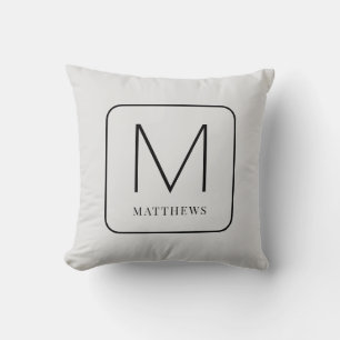 Almohada gris y negra simple con monograma moderno