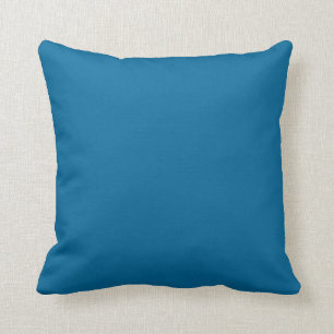 Almohada llana del azul del color sólido