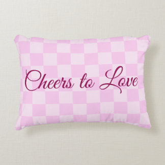 Almohada lumbar de damero rosa 'Brindis al amor'