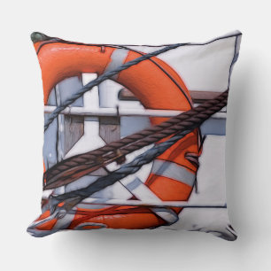 almohada marina con salvavidas rojas