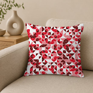 Almohada moderna con patrón geométrico rojo