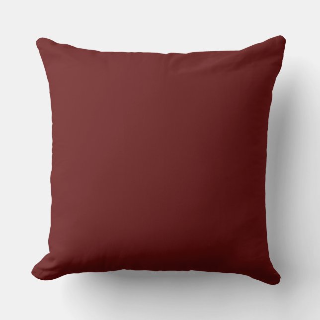 Almohada moderna de color burdeos (Anverso)
