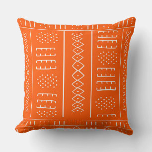 Almohada naranja de patrón africano