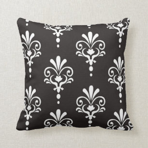 Almohada negra elegante moderna del ikat del