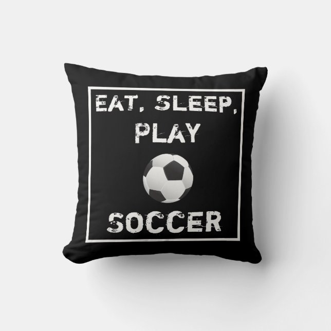 Almohada negra y blanca del fútbol de Eat Sleep (Anverso)