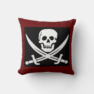 ALMOHADA PIRATA DE CRÁNEO Y HUESOS CRUZADOS