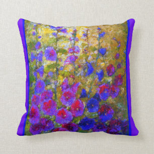 Almohada púrpura del jardín de los Hollyhocks de