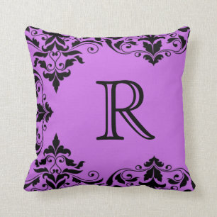 Almohada púrpura y negra del damasco del monogram