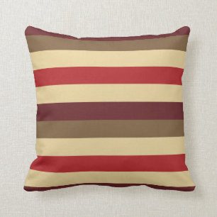 Almohada rayada de los rojos calientes
