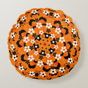almohada redonda con motivos ornamentales