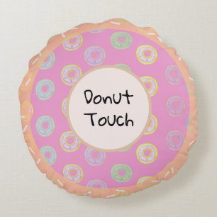 Almohada redonda con toque de donut rosado