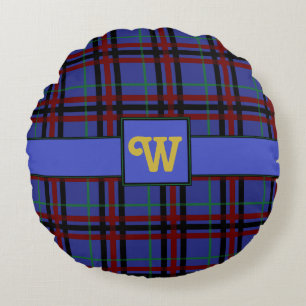 Almohada redonda de cuadros con tonos de joya