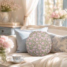 Almohada redonda de flores delicadas acuarela