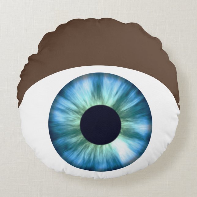 Almohada Redonda de Piel Oscura Ojo Azul (Anverso)