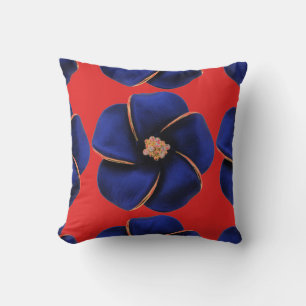almohada roja con flores de seda azul