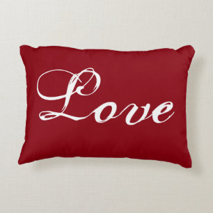 Almohada roja del "amor" con la parte posterior