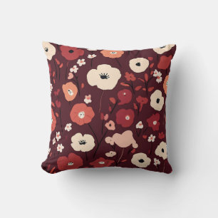 Almohada roja profunda con diseño de clúster flora